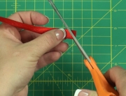 Finishing red ribbon end